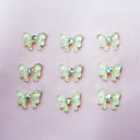 10pcs plastique blanc Décorations Twinkle Nail Art de petits papillons